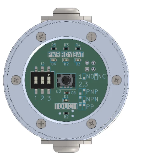 The receiver opened, showing the output configurator switch and the NO/NC, PNP/NPN/PP legend printed on the board